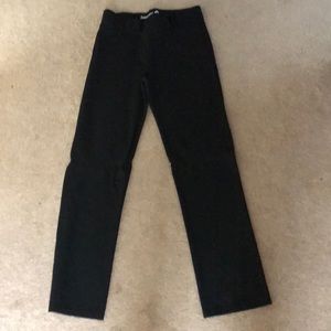 Black yoga pants with belt loops.  Size Medium.